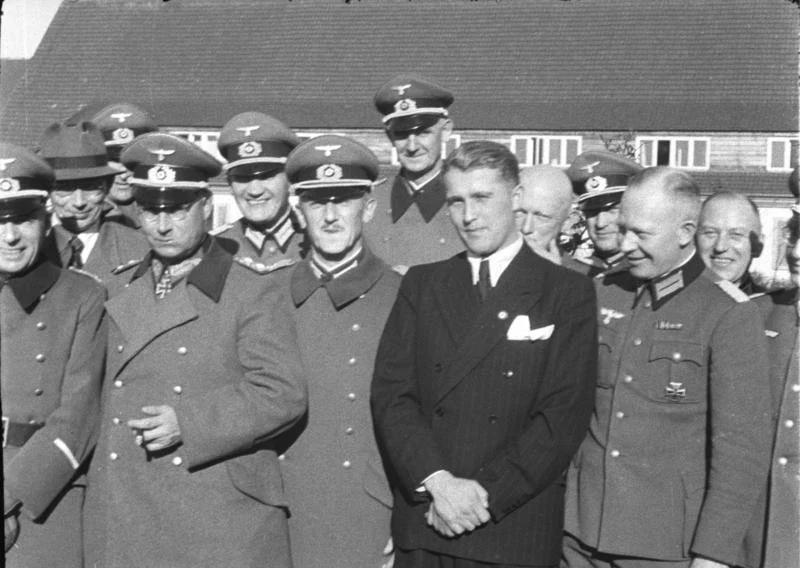 Wernher von Braun (in suit) with German officers in 1941. Bundesarchiv